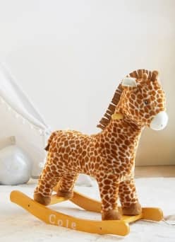 A rocking giraffe toy.