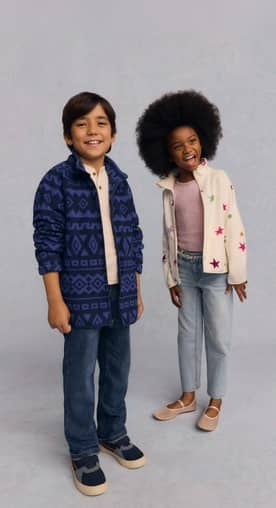A girl and boy are shown wearing microfleece zip-up jackets.