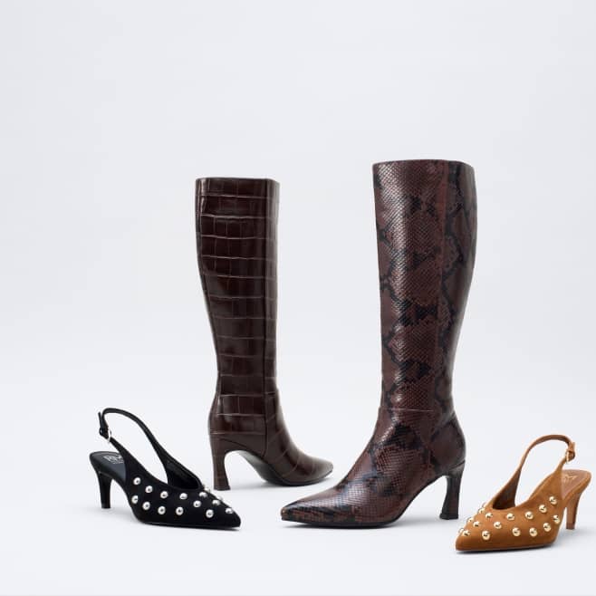 Four womens shoes including two tall brown boots and two studded slingback heels.