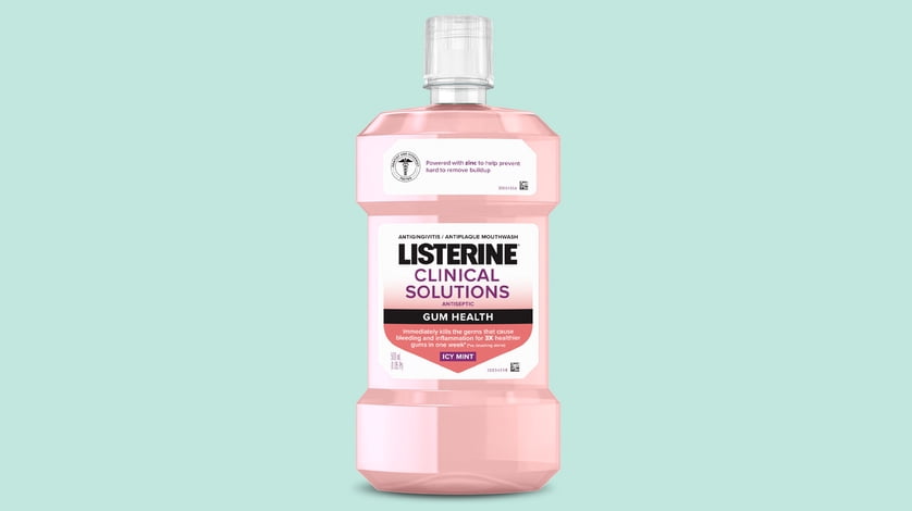 Listerine clinical solutions product on a green background.