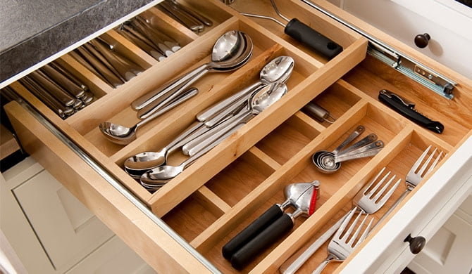 kitchen drawer full of neatly organized silverware