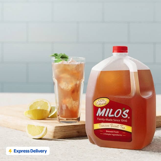 Express Delivery. Subject to availability. Restrictions and fees apply. Milo’s famous sweet tea, a glass of iced tea and lemon wedges.