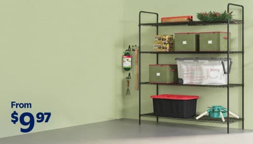 An image of black shelves stacked with colorful bins in multiple sizes and styles, set against a green wall.