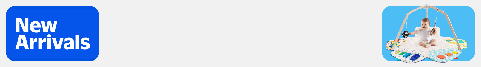 An image of a baby playing with toys.