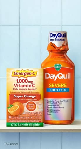 Image shows a box of Emergen-C Daily Immune Support & bottle of DayQuil on a countertop.