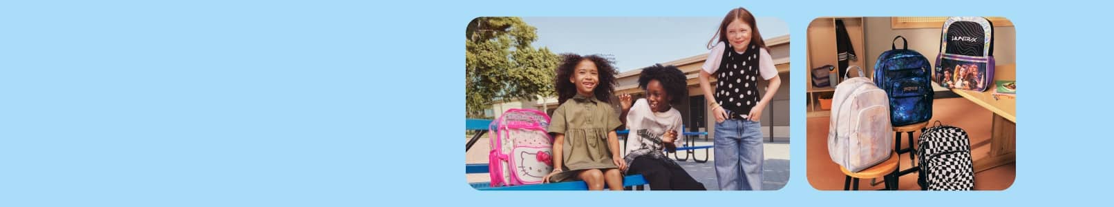 Three children sitting outside school wearing back to school outfits and assortment of backpacks displayed on stools and desk in school setting.