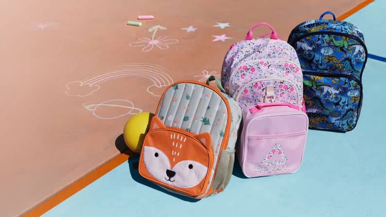 Plush lion, dinosaur print and quilted floral kids’ backpacks with matching lunch boxes. From five dollars in lower left corner.