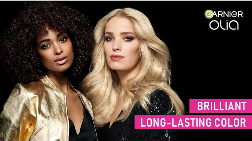 Two people with shiny hair show the impact of using Garnier Olia.