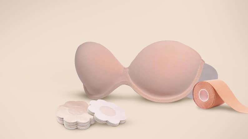 A backless strapless nude bra, beige breast lift tape and nude sticky nipple pasties covers are shown.