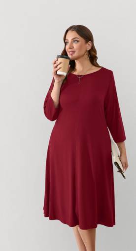 A stylish woman in a red dress.