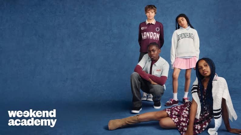 Four tweens in a range of fall back to school outfits including a rugby shirt, sweatshirt, skirt, floral dress, cardigan and denim.