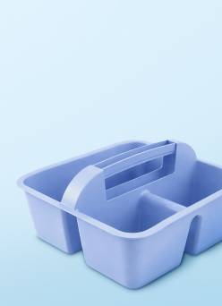 Light blue plastic storage caddy with multiple compartments and a central handle.