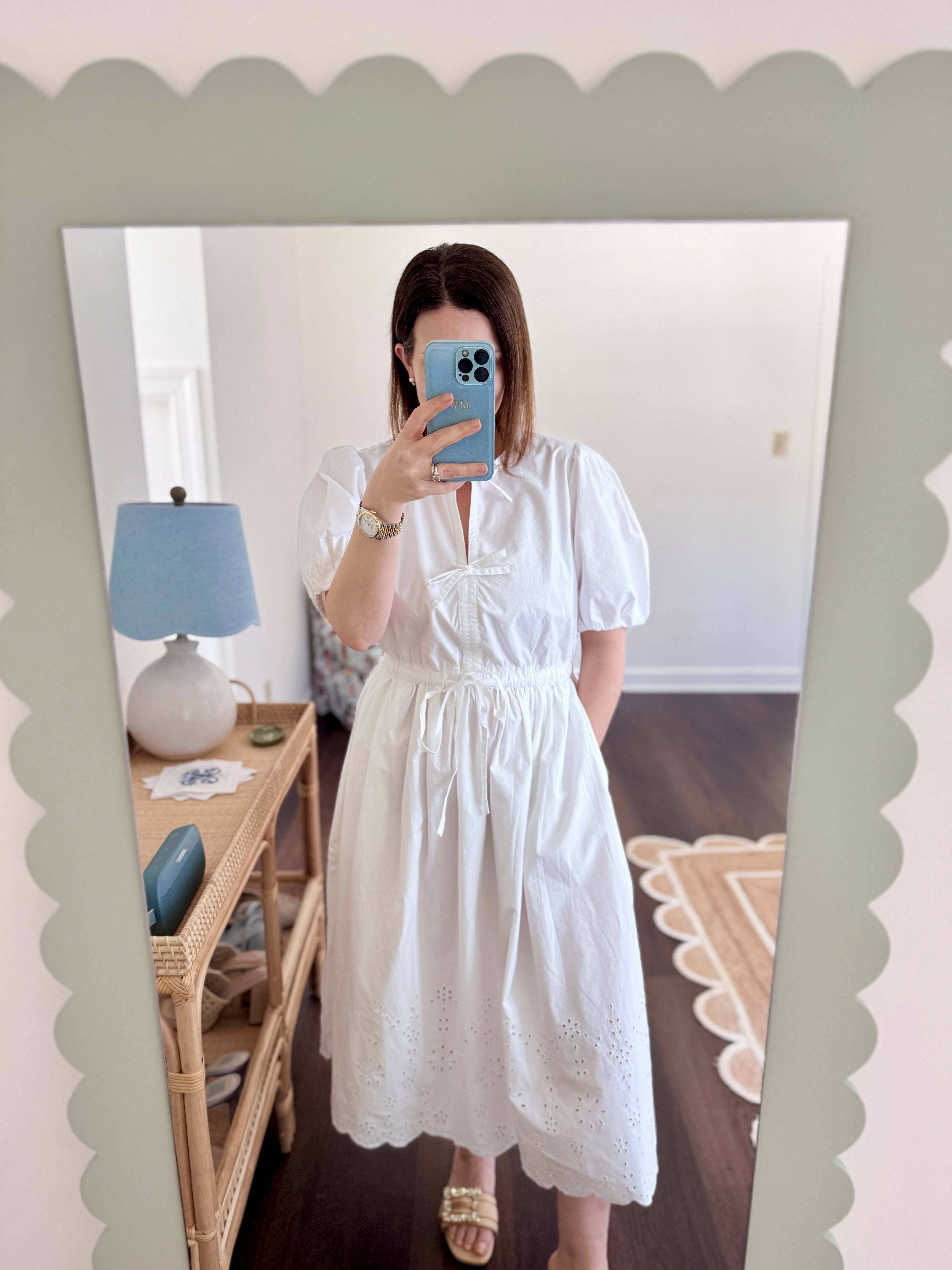 White bow dress with a pretty eyelet detail towards the hem. I wish I had sized down in this one. , Shop post, 