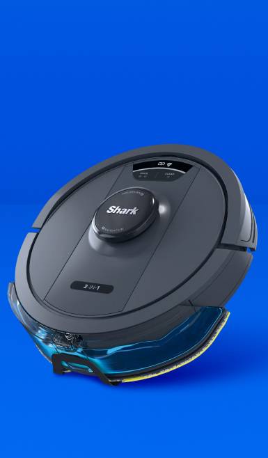 A black Shark robot vacuum.