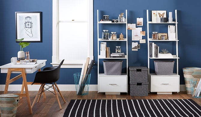 home office with desk and and white bookcases