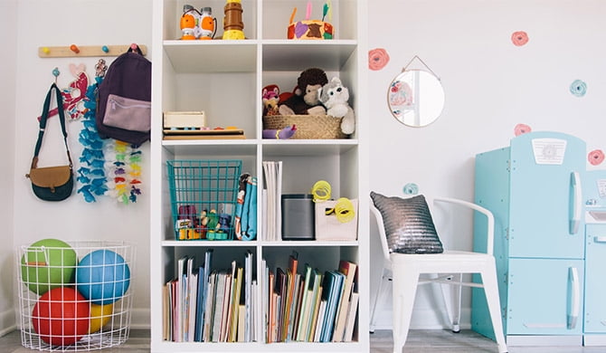 kids' playroom with a wire basket and cube storage