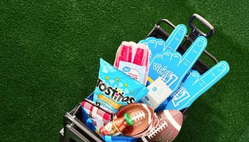 Image shows a wagon filled with tailgating supplies.