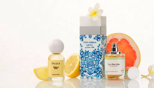 Banner of various perfumes with citrus in the background. Text: New fragrances from $14. Shop now.