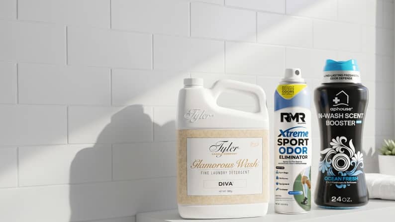A bottle of detergent, a bottle of odor eliminator and a bottle of scent booster.