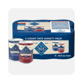 Image shows Blue Buffalo Homestyle Recipe adult wet dog food, a chicken and beef dinner variety pack with six cans on a white background.