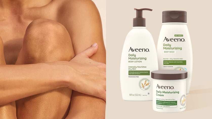 Close up of a model hugging her legs next to Aveeno Daily Moisturizing lotion, cream, and body wash.