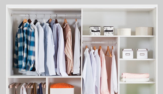 Closet with hanging clothes