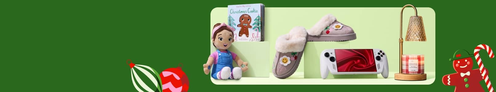 View a collection of items including a PlayStation Portal, a candle-heating lamp, fuzzy slippers, books and more.