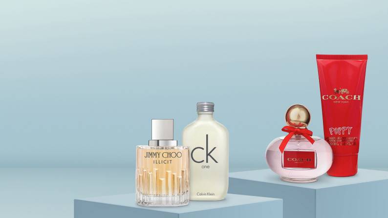 One scented lotion and four bottles of designer perfume.