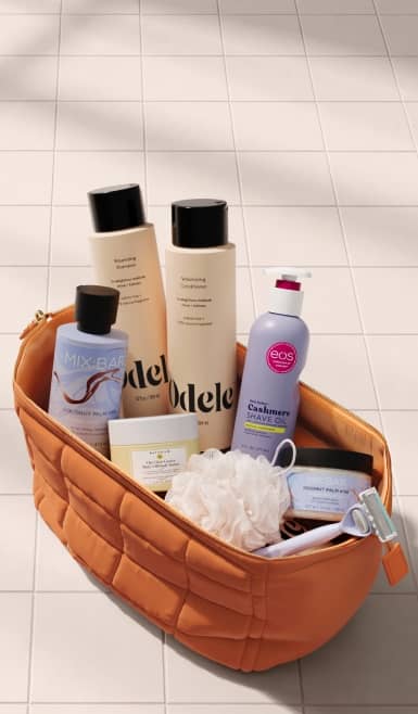 Mix Bar cream body wash, Odele shampoo and conditioner, eos shave oil,
naturium body butter, Mix Bar sugar body scrub, a loofah and razor.