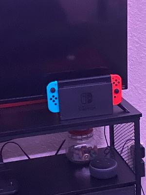 Nintendo Switch System: Gaming Console with Neon Blue and