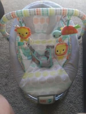 bright starts whimsical wild cradling bouncer seat with soothing vibration & melodies