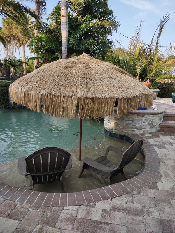 hula patio umbrella 6.5ft Tahtched Tiki Umbrella, Beach Hawaiian Style looking steel stake poles to effortlessly anchor into the sand or grass 9.5 Ft. Hula Tiki Thatch