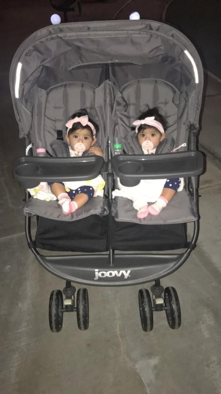 Double stroller top with tray