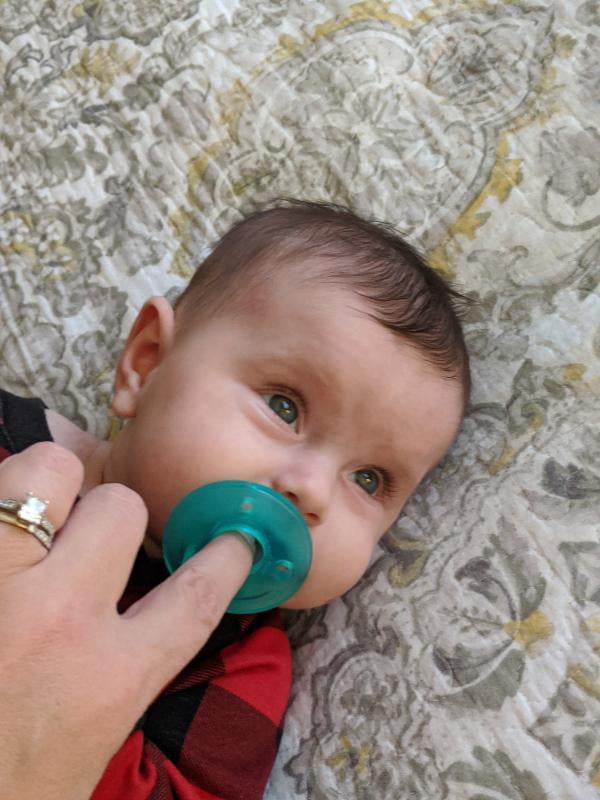 soothie pacifier with nose cut out