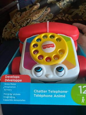 Fisher Price Téléphone Roulant roulette toy story jouet a tirer Fisher Price Téléphone Roulant roulette toy story jouet a tirer