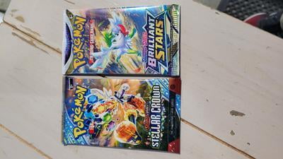 half pokemon booster box Pokémon TCG: Surging Sparks SV8 Half Booster Box main image 1