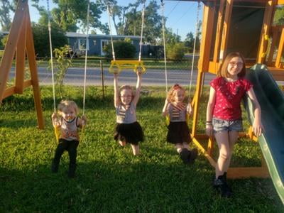 spring meadow wooden swing set