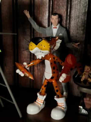 Jada Toys Cheetos Chester Cheetah Action Figure 6‚Äù Glow in the