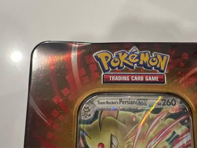 pokemon trading card games fall team rocket tin tcg Black & White: Next Destinies