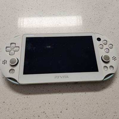 Authentic PlayStation PS Vita 2000 Console WiFi - White/Light Blue Authentic PlayStation PS Vita 2000 Console WiFi - White/Light Blue