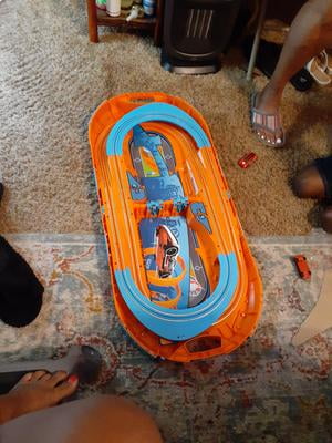 Hot Wheels Slot Track Pack with Carrying Case, Two 1:64 Cars, and