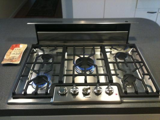 cooktop with pop up exhaust