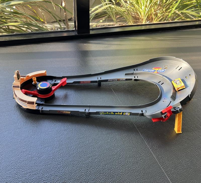 Disney and Pixar Cars NASCAR Lane Change Race Playset with 2 Toy