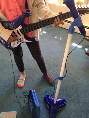 toy guitar and microphone set