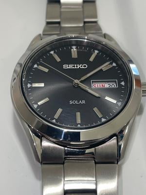 Seiko solar daydate SEIKOソーラーデイデイト Seiko Men's Solar Two-Tone Quartz Watch, Charcoal Dial, 39mm