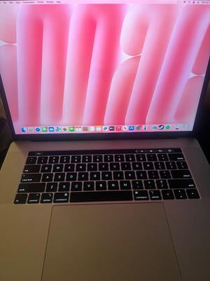 Restored Apple Macbook Pro A1990 15