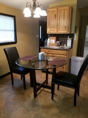 Ashley charrell 2024 round dining table