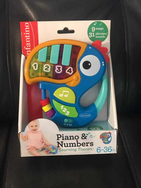 infantino toucan piano