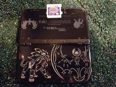 new 3ds xl solgaleo lunala black edition