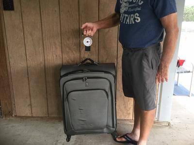 american tourister luggage scale change to lbs